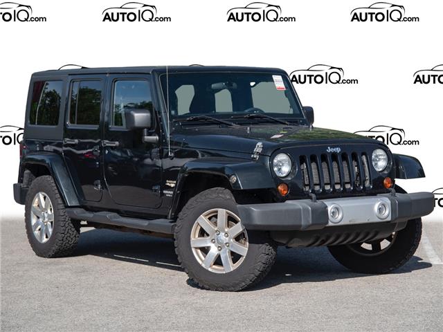 2012 Jeep Wrangler Unlimited Sahara (Stk: 8020AX) in Welland - Image 1 of 18