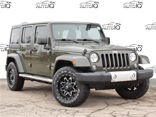 2015 Jeep Wrangler Unlimited Sahara (Stk: 98197) in St. Thomas - Image 1 of 25