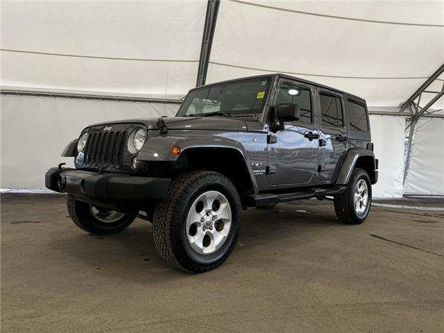 2016 Jeep Wrangler Unlimited Sahara (Stk: 196907) in AIRDRIE - Image 1 of 15