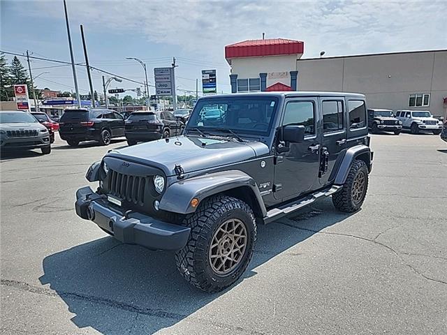 2017 Jeep Wrangler Unlimited Sahara (Stk: 23097A) in Sherbrooke - Image 1 of 12