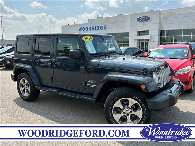 2018 Jeep Wrangler JK Unlimited Sahara (Stk: P-1340A) in Calgary - Image 1 of 20