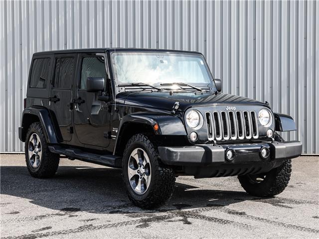 2018 Jeep Wrangler JK Unlimited Sahara (Stk: B23-93A) in Cowansville - Image 1 of 28