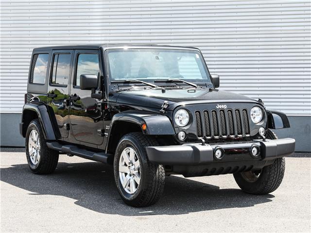 2018 Jeep Wrangler JK Unlimited Sahara (Stk: G23-253) in Granby - Image 1 of 31