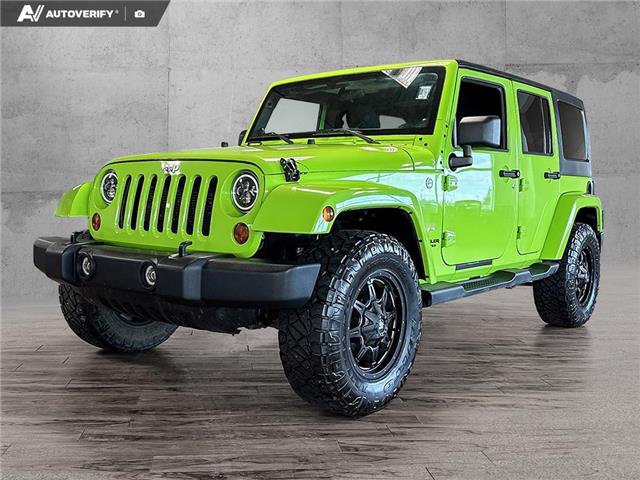 2012 Jeep Wrangler Unlimited Sahara (Stk: P15112) in Airdrie - Image 1 of 25