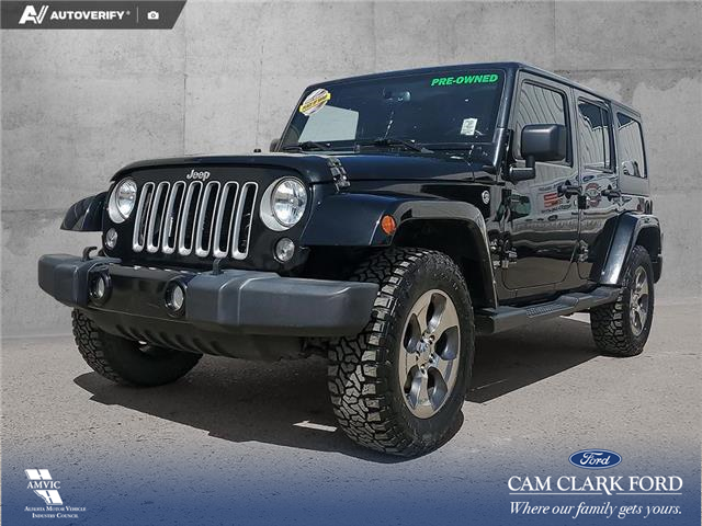 2018 Jeep Wrangler JK Unlimited Sahara (Stk: U38059) in Red Deer - Image 1 of 25 2018 Jeep Wrangler JK Unlimited Sahara (Stk: U38059) in Red Deer - Image 1 of 25