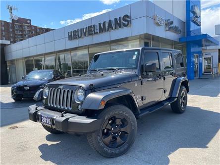 2016 Jeep Wrangler Unlimited Sahara (Stk: N144A) in Chatham - Image 1 of 21