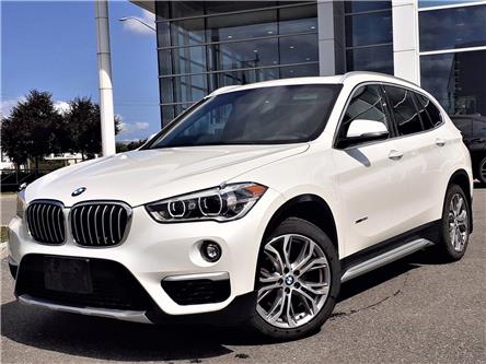 2018 BMW X1 xDrive28i (Stk: P10647A) in Gloucester - Image 1 of 25