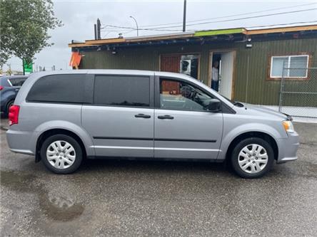 2017 Dodge Grand Caravan CVP/SXT (Stk: 582597) in Calgary - Image 1 of 11