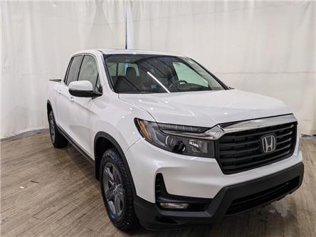 2023 Honda Ridgeline Touring (Stk: 2380030) in Calgary - Image 1 of 24