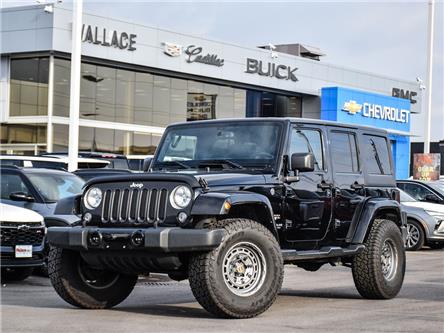 2017 Jeep Wrangler Unlimited 4WD Sahara, Hard Top, Manual, Falken A/T Tires (Stk: 105349A) in Milton - Image 1 of 22