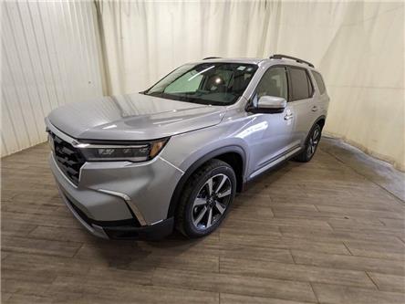 2025 Honda Pilot Touring (Stk: 2560030) in Calgary - Image 1 of 23