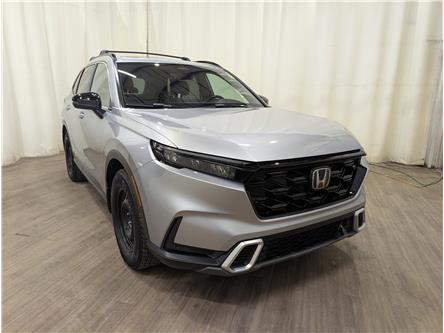 2023 Honda CR-V Hybrid Touring (Stk: 25032227) in Calgary - Image 1 of 27