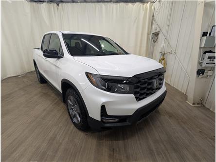 2025 Honda Ridgeline TrailSport (Stk: 2580020) in Calgary - Image 1 of 24