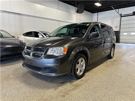 2015 Dodge Grand Caravan SE/SXT (Stk: P13741) in Calgary - Image 1 of 19