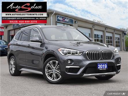 2019 BMW X1 xDrive28i (Stk: 1TVMX11) in Scarborough - Image 1 of 28