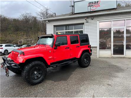 2013 Jeep Wrangler Unlimited Sahara in Greater Sudbury - Image 1 of 8