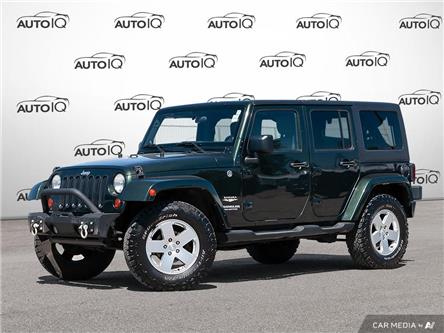2011 Jeep Wrangler Unlimited Sahara (Stk: 65010AX) in St. Thomas - Image 1 of 27