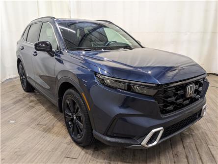 2025 Honda CR-V Hybrid Touring (Stk: 2550342) in Calgary - Image 1 of 24