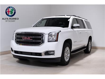2020 GMC Yukon XL SLE (Stk: ARUC876A) in Calgary - Image 1 of 32 2020 GMC Yukon XL SLE (Stk: ARUC876A) in Calgary - Image 1 of 32