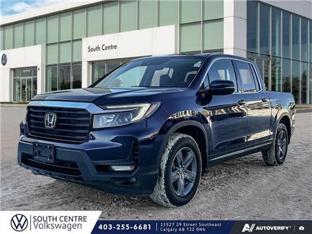 2021 Honda Ridgeline Touring (Stk: SU7699) in Calgary - Image 1 of 23 2021 Honda Ridgeline Touring (Stk: SU7699) in Calgary - Image 1 of 23