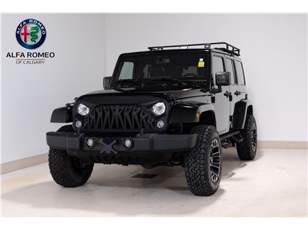 2017 Jeep Wrangler Unlimited Sahara (Stk: ARUC979) in Calgary - Image 1 of 28