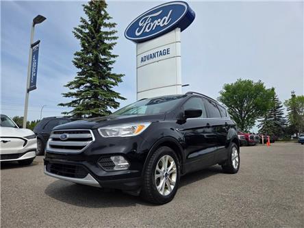 2018 Ford Escape SE (Stk: 7118A) in Calgary - Image 1 of 15 2018 Ford Escape SE (Stk: 7118A) in Calgary - Image 1 of 15