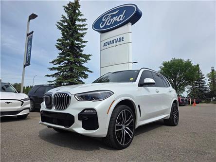 2019 BMW X5 xDrive50i (Stk: 7124A) in Calgary - Image 1 of 16 2019 BMW X5 xDrive50i (Stk: 7124A) in Calgary - Image 1 of 16