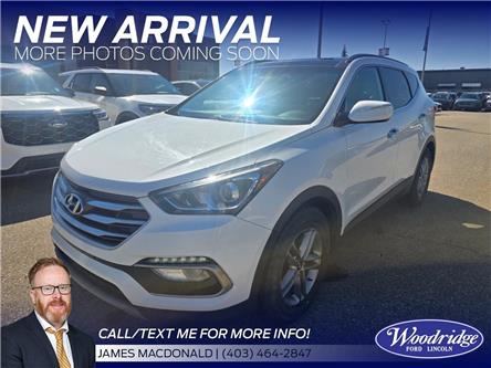 2018 Hyundai Santa Fe Sport 2.4 Luxury (Stk: T-1144A) in Calgary - Image 1 of 4 2018 Hyundai Santa Fe Sport 2.4 Luxury (Stk: T-1144A) in Calgary - Image 1 of 4