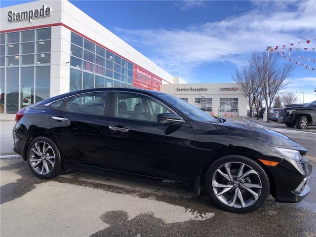 2020 Honda Civic Touring (Stk: 9825B) in Calgary - Image 1 of 23