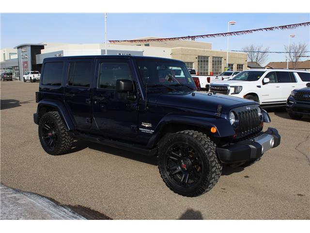 2013 Jeep Wrangler Unlimited Sahara (Stk: 138207) in Medicine Hat - Image 1 of 17
