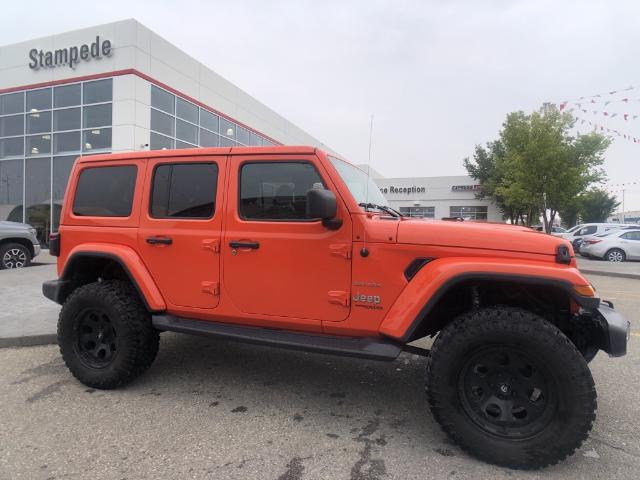 2018 Jeep Wrangler Unlimited Sahara (Stk: 230803A) in Calgary - Image 1 of 12