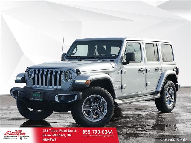 2019 Jeep Wrangler Unlimited Sahara (Stk: 62341) in Essex-Windsor - Image 1 of 31
