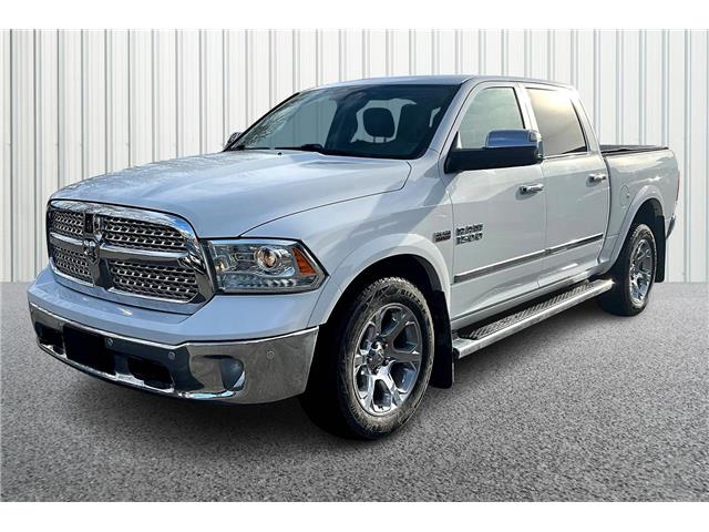 2017 RAM 1500 Laramie White with 154,115km at $32,888