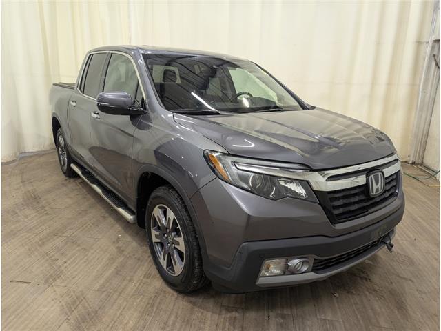 2019 Honda Ridgeline Touring (Stk: 25031216) in Calgary - Image 1 of 27