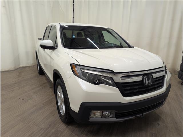 2019 Honda Ridgeline Touring (Stk: 25032853) in Calgary - Image 1 of 29