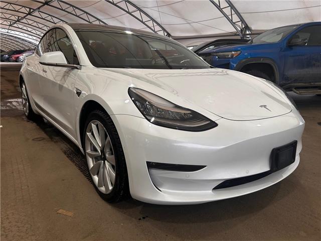 2018 Tesla Model 3  5YJ3E1EB0JF111150 218643 in AIRDRIE