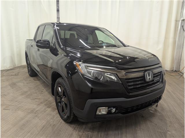 2017 Honda Ridgeline Black Edition (Stk: 25041421) in Calgary - Image 1 of 27