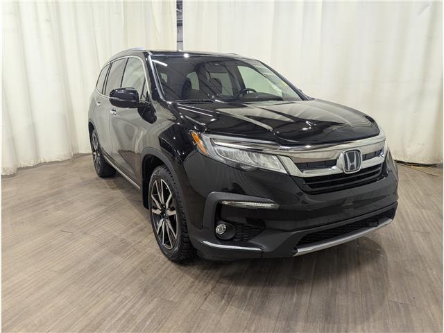 2019 Honda Pilot Touring 5FNYF6H91KB505637 25042339 in Calgary