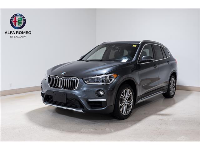 2018 BMW X1 xDrive28i (Stk: ARUC828) in Calgary - Image 1 of 32
