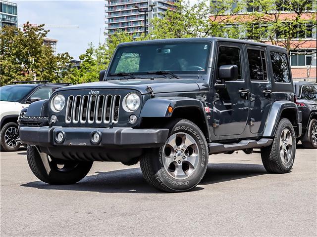 2016 Jeep Wrangler Unlimited Sahara (Stk: T8256A) in Toronto - Image 1 of 16