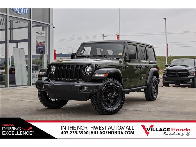 2021 Jeep Wrangler Unlimited Sport (Stk: RQ1185A) in Calgary - Image 1 of 42