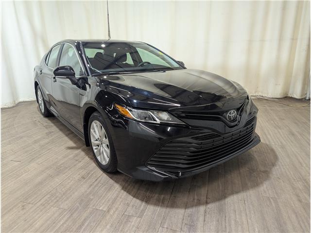 2019 Toyota Camry LE (Stk: 25060708) in Calgary - Image 1 of 25