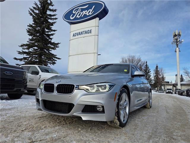 2018 BMW 330i xDrive (Stk: 7040A) in Calgary - Image 1 of 9