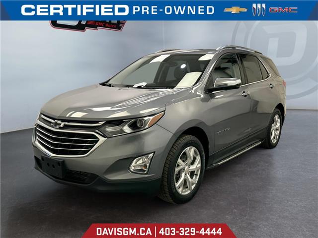 2018 Chevrolet Equinox Premier 3GNAXXEU9JL178554 302713 in Lethbridge