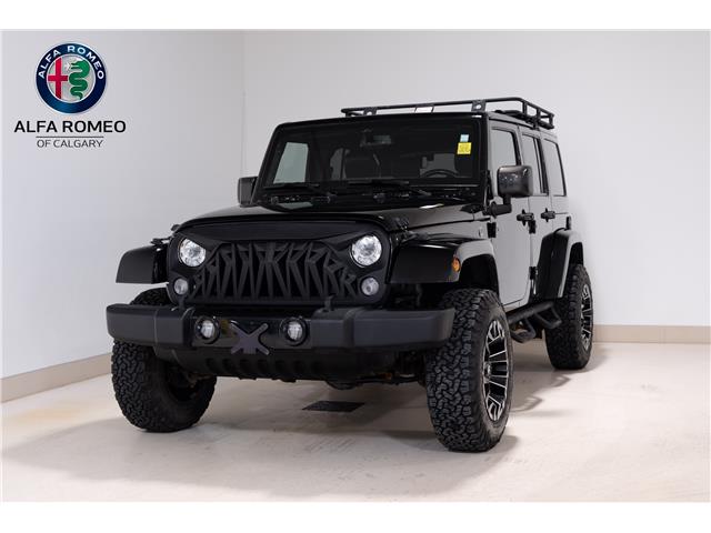 2017 Jeep Wrangler Unlimited Sahara (Stk: ARUC979) in Calgary - Image 1 of 28