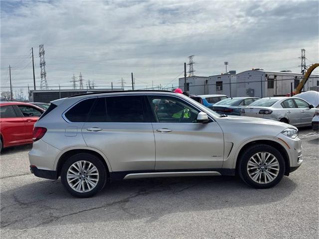 2015 BMW X5 xDrive35i Gold with 200,741km at $13,999