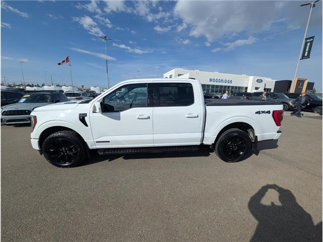 2023 Ford F-150 Lariat (Stk: T-1164A) in Calgary - Image 4 of 26 2023 Ford F-150 Lariat (Stk: T-1164A) in Calgary - Image 4 of 26