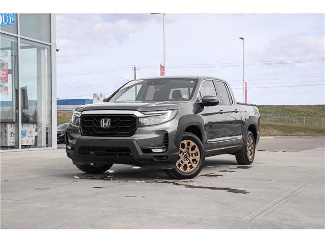 2023 Honda Ridgeline Touring (Stk: B9110) in Calgary - Image 2 of 33 2023 Honda Ridgeline Touring (Stk: B9110) in Calgary - Image 2 of 33