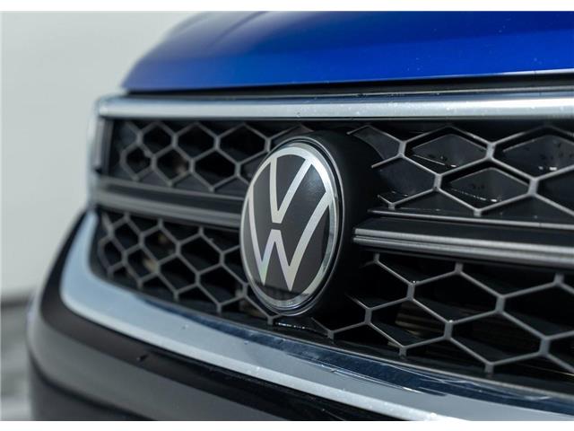2024 Volkswagen Taos Comfortline (Stk: TU0289) in Calgary - Image 11 of 32