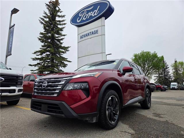 2024 Nissan Rogue SV Moonroof (Stk: TA-576A) in Calgary - Image 1 of 15